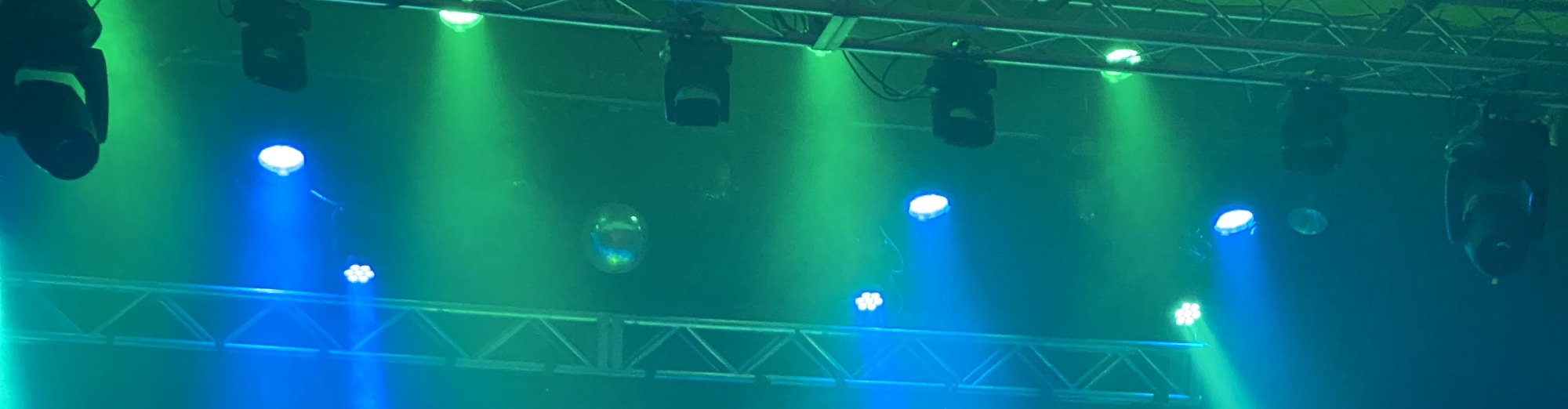 blue and green theater stage lights Asheville